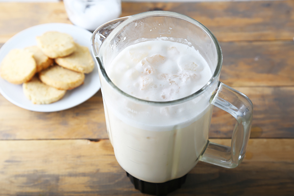 Iced ketoproof green tea blended smooth and frothy in a glass blender pitcher
