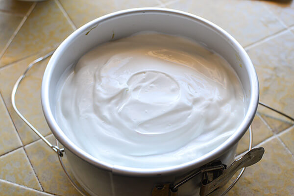 Pour the cheesecake batter into a well greased spring form pan. You will need a pan that is no larger than 6-7 inches so that it fits inside your Instant Pot.