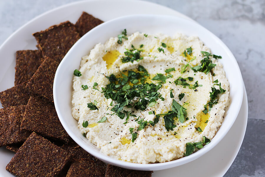 Delicious Cauliflower Hummus with Harissa Crackers