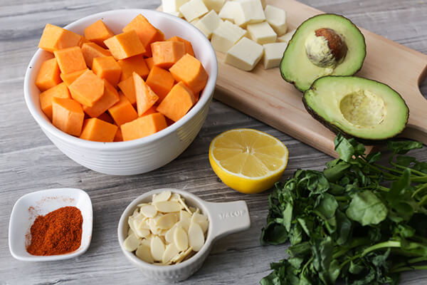Table with ingredients for pumpkin salad.