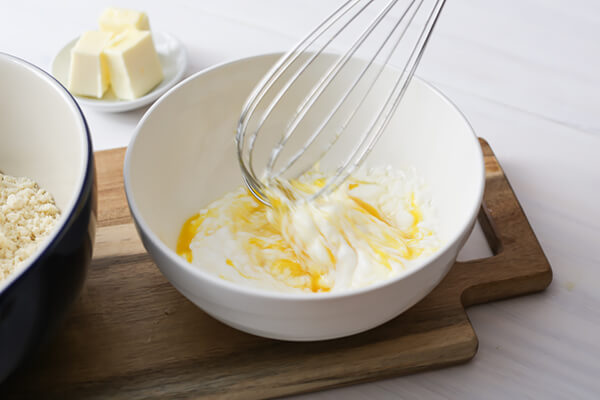 Whisking the wet ingredients together.
