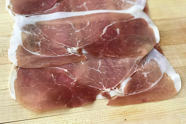 Prosciutto slices.