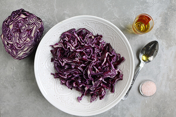 Creating the coleslaw.