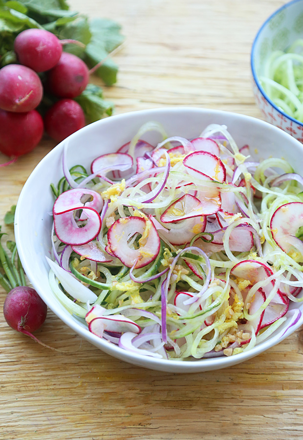 Cucumber noodles and radish slices tossed with lemon ginger dressing, fresh radishes alongside