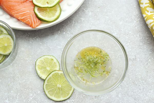 Lime zest, lime juice, and tequila marinade whisked together in a small glass bowl