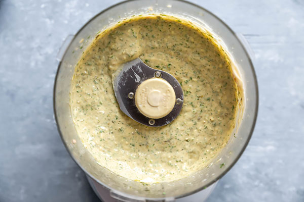 Tonnato sauce blended smooth with tuna, basil, and capers in a food processor